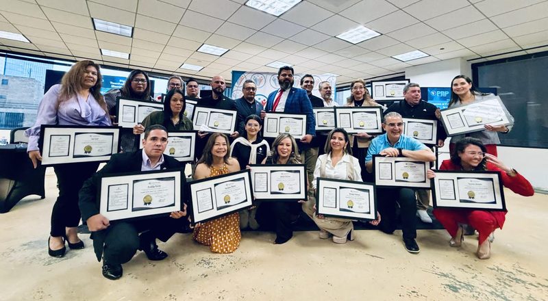 Create Interest leadership certification graduating class holding framed certificates